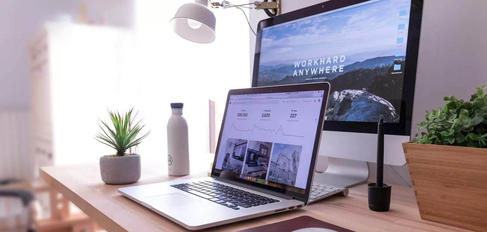Custom Perth website designs displayed across desktop and laptop screens